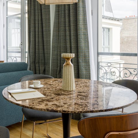 Enjoy your morning Nespresso coffee with a view out onto the Haussmann buildings