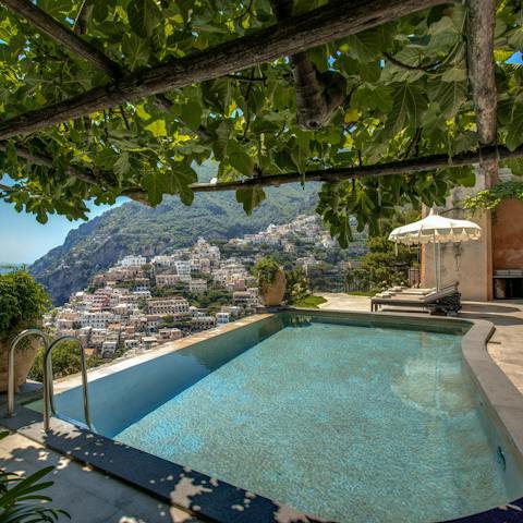 Swim laps in the infinity pool and gaze out over Positano