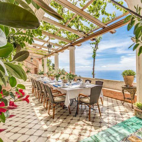 Toast to glorious sunsets over the Amalfi Coast from the dining table