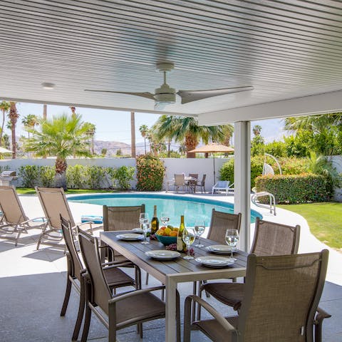 Light the barbecue and enjoy an alfresco meal as the palm trees dance in the background