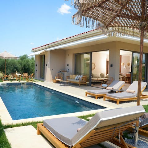 Stretch out on the loungers in between pool dips