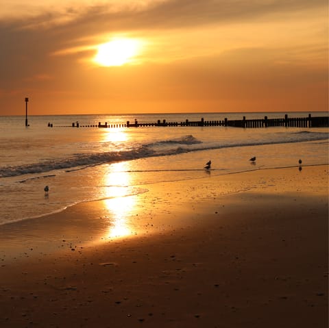 Experience some incredible sunsets on the beaches of the Norfolk Coast AONB