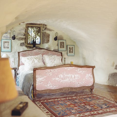 Cosy, cave-like rooms decorated with care and textiles