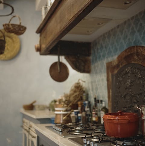 Rustle up a classic dish in this rustic kitchen, with a local wine pairing to accompany your meal