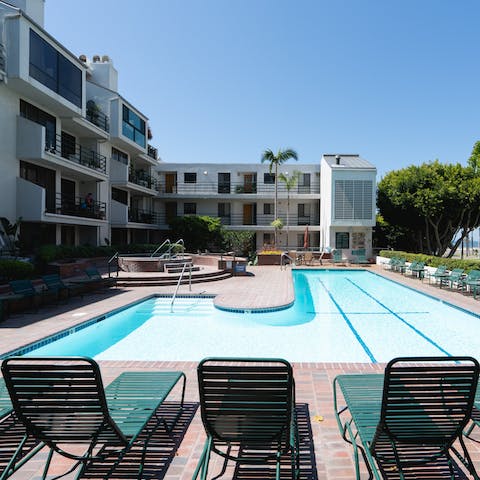 Introduce yourself to your neighbours by the inviting communal pool