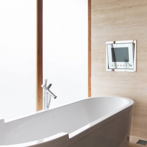 Sink into the bathtub for a relaxing soak after a day of sightseeing