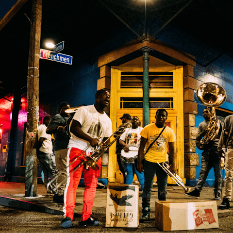 Experience a local flavor of both music and food at Frenchmen Street, less than ten minutes away by car