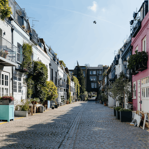 Discover Notting Hill's adorable streets and boutique shops a short stroll away