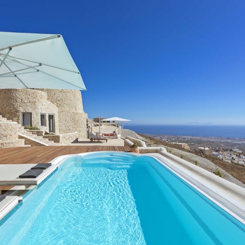 Take a dip in the pool and soak up sweeping views to the Aegean Sea