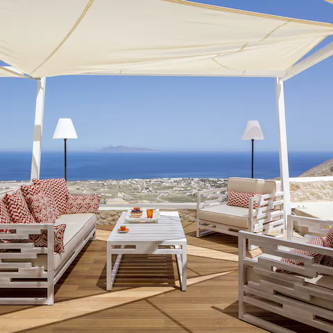 Plan a walk to Pyrgos Kallistis Castle while lounging under the pergola