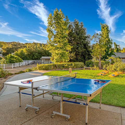 Unleash your sporting skills over a game of ping pong outside