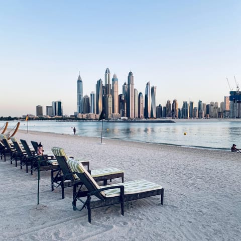 Settle in for a day of sunbathing at Palm West Beach