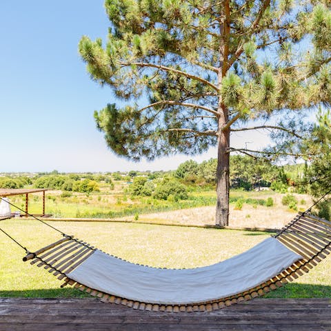 Enjoy the natural beauty of the garden from the hammock