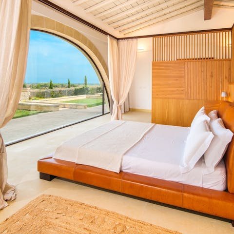 Wake up to views of the grounds from the huge arched windows