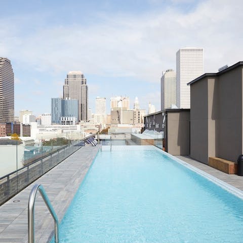 Gaze across the city while swimming in the shared rooftop pool