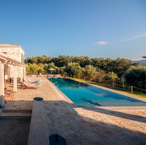 Slip into the private swimming pool after a morning on the sun lounger