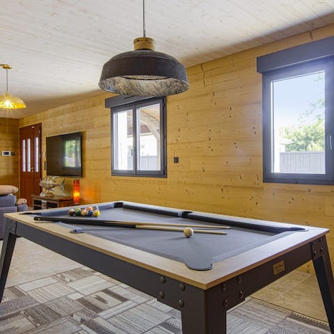 Get competitive and challenge your guests to a round of pool 