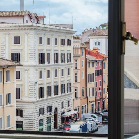 Stay in a typical period apartment with views over the historic streets below