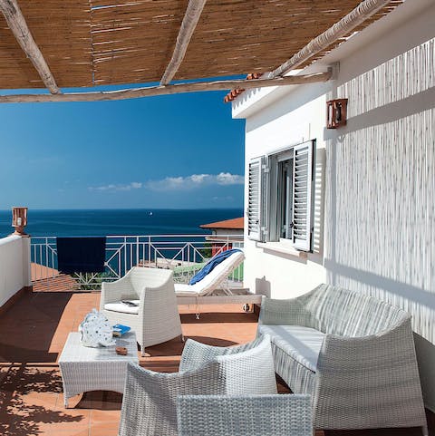 Settle down with a book on your private terrace with the ocean as your backdrop
