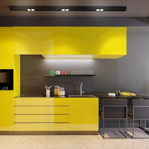 Enjoy cooking in the bright yellow kitchen area