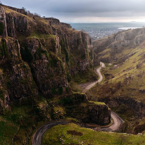 Explore the ancient Cheddar Gorge, less than a ten-minute drive away