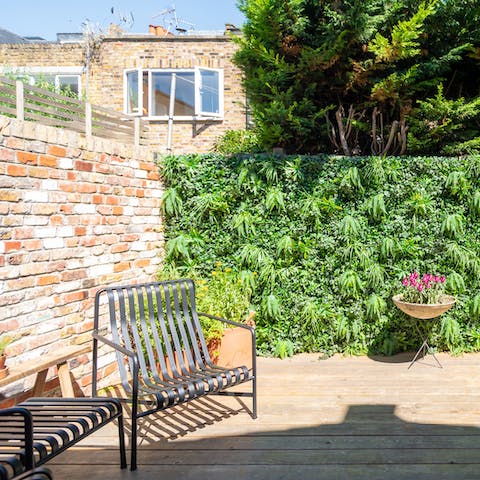 Soak up the sunshine out on the home's terrace and perhaps light up the barbecue