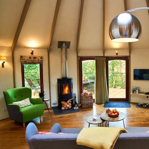 Cosy up on the sofa in front of the wood burning stove after a long day on your feet 