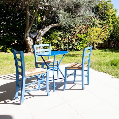 Sip on sundowners and watch the sunset from your patio, complete with table and chairs