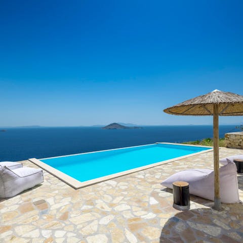 Look out at a spectacular seascape from your private infinity pool
