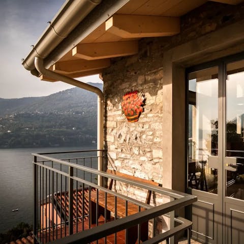 Sit on your balcony with a glass of wine and gaze at the reflections in the lake
