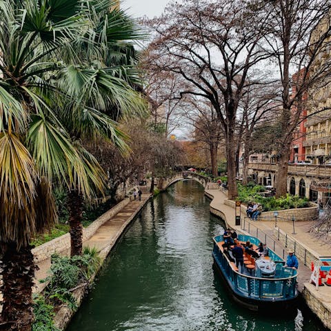 Visit San Antonio River Walk, a fifteen-minute drive away