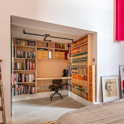 Catch up on work in the quirky library space in the main bedroom