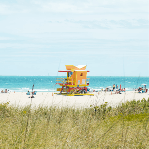 Wander over to Miami Beach and sprawl out in the sand – it's a one-minute walk away