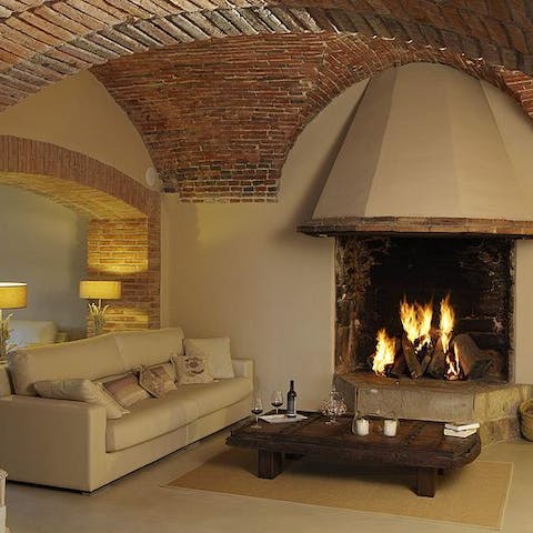 Settle in by one of the crackling fires inside