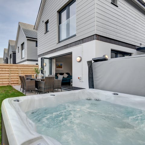 Relax in the hot tub after a busy day