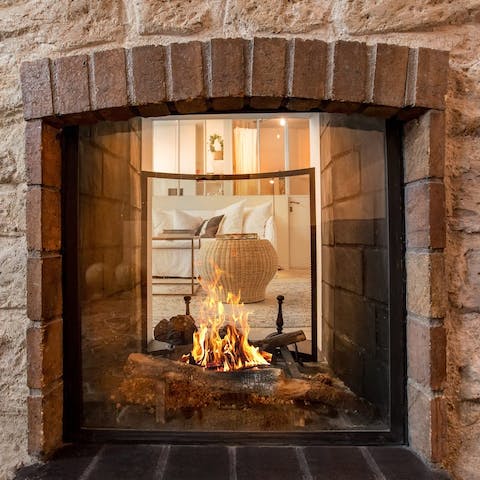 Cosy up by the dual aspect fireplace, whether you're in the living room or bedroom