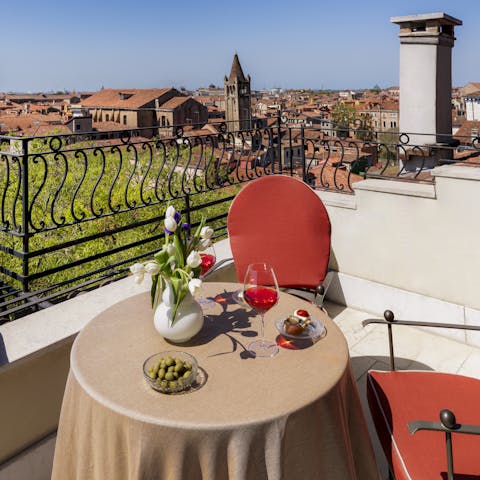 Sit out on the balcony with a bellini and look out across the city