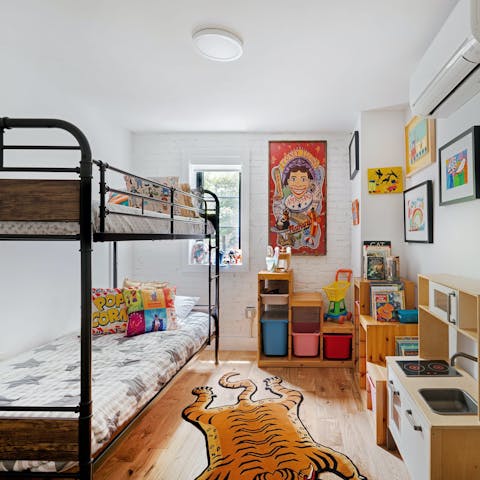 Let little ones unwind in peace in the third bedroom perfect for kids