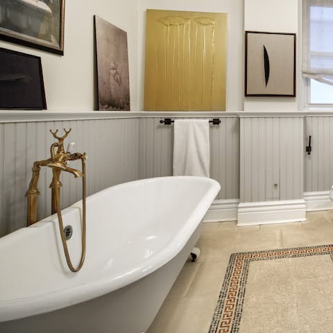 Sink into the clawfoot bathtub for a long, luxurious soak after sightseeing around Manhattan