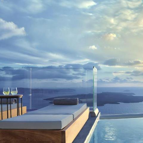 Relax on the sun bed after a dip in the shared infinity pool