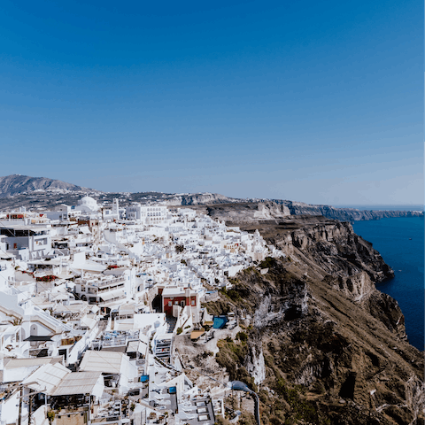 Stay in Santorini's capital, Thera, just a fifteen-minute walk to the centre