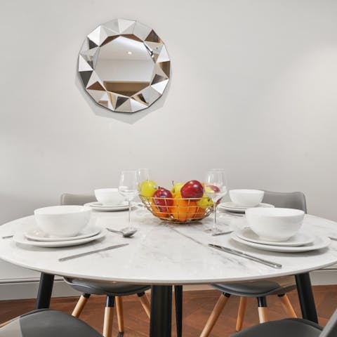 Have a leisurely breakfast at the elegant dining table