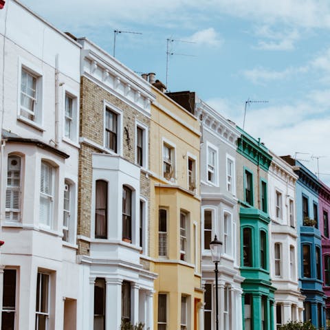 Head for the market and iconic pastel townhouses of Portobello Road, a twenty minute walk