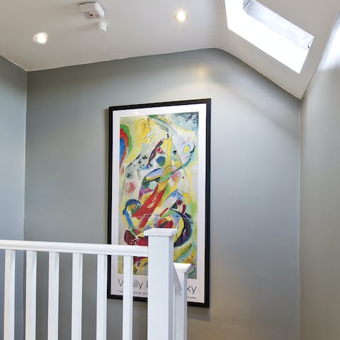Enjoy pops of vibrant art throughout the home