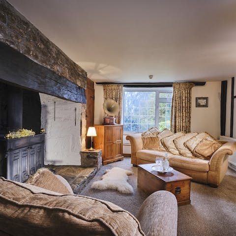 Curl up by the inglenook fireplaces and wood burning stoves in one of two cosy living rooms 