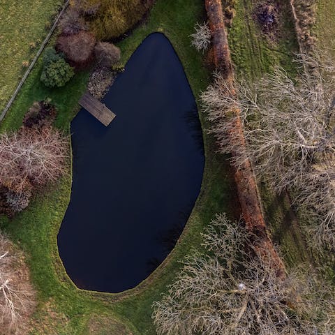 Walk out to the home's private lake