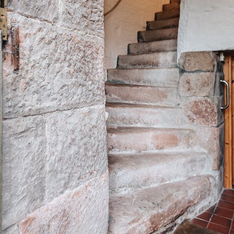 Climb the tower's stone spiral staircase