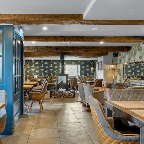 Spend a cosy evening in the village pub just downstairs – there's a menu of locally-sourced food