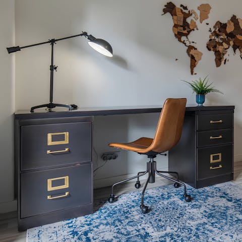Open your laptop at the bedroom desk and work remotely