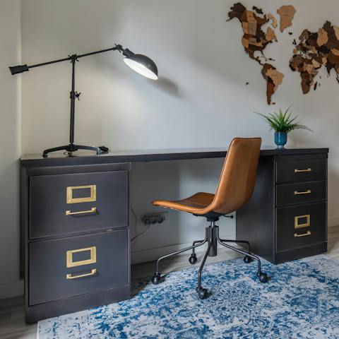 Open your laptop at the bedroom desk and work remotely